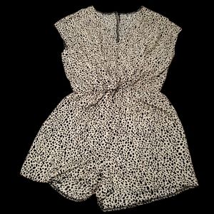 Shorts, romper, Animal patterns, beige color and black.